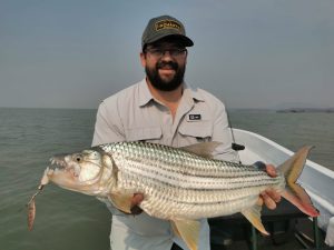 Fishing guide with trophy tigerfish in Cahora Bassa Mozambique